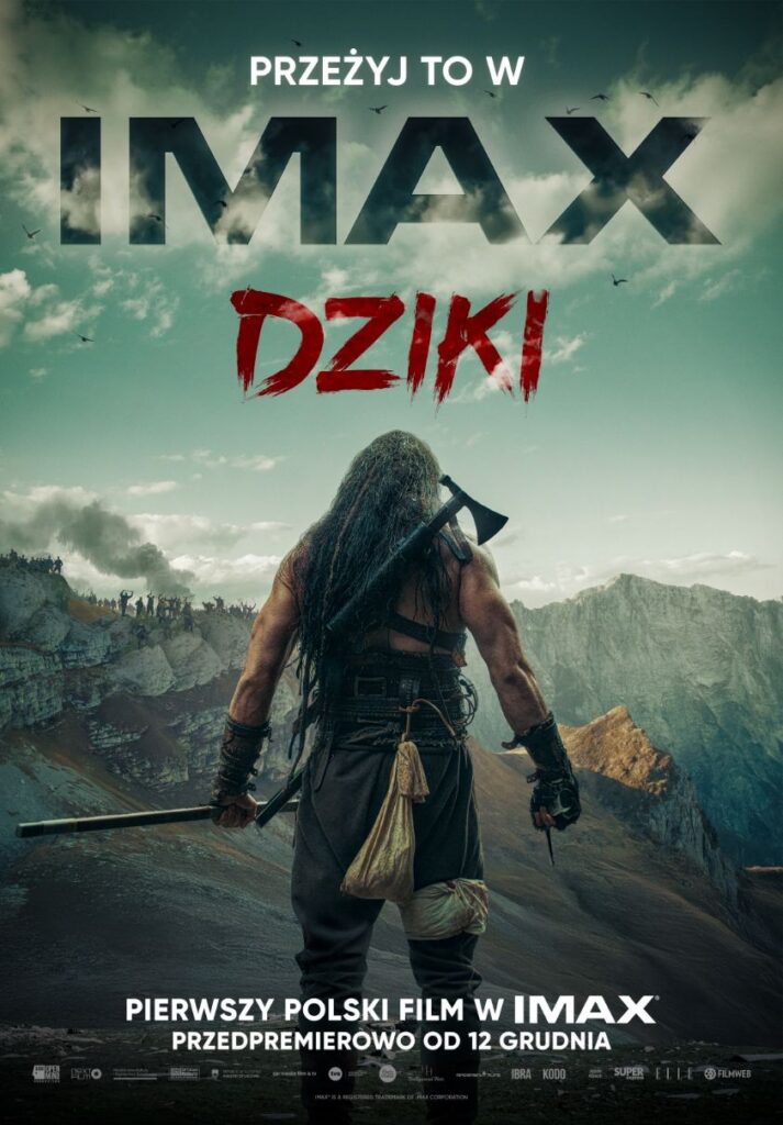 Plakat IMAX filmu "Dziki", reż. Maciej Kawulski z postacią stojącą plecami i dużym napisem "Przeżyj to w Imax".